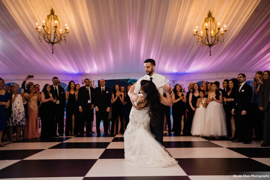 LED uplighting in warm tones at a Boston wedding reception