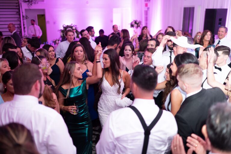 bride dancing pink uplighting
