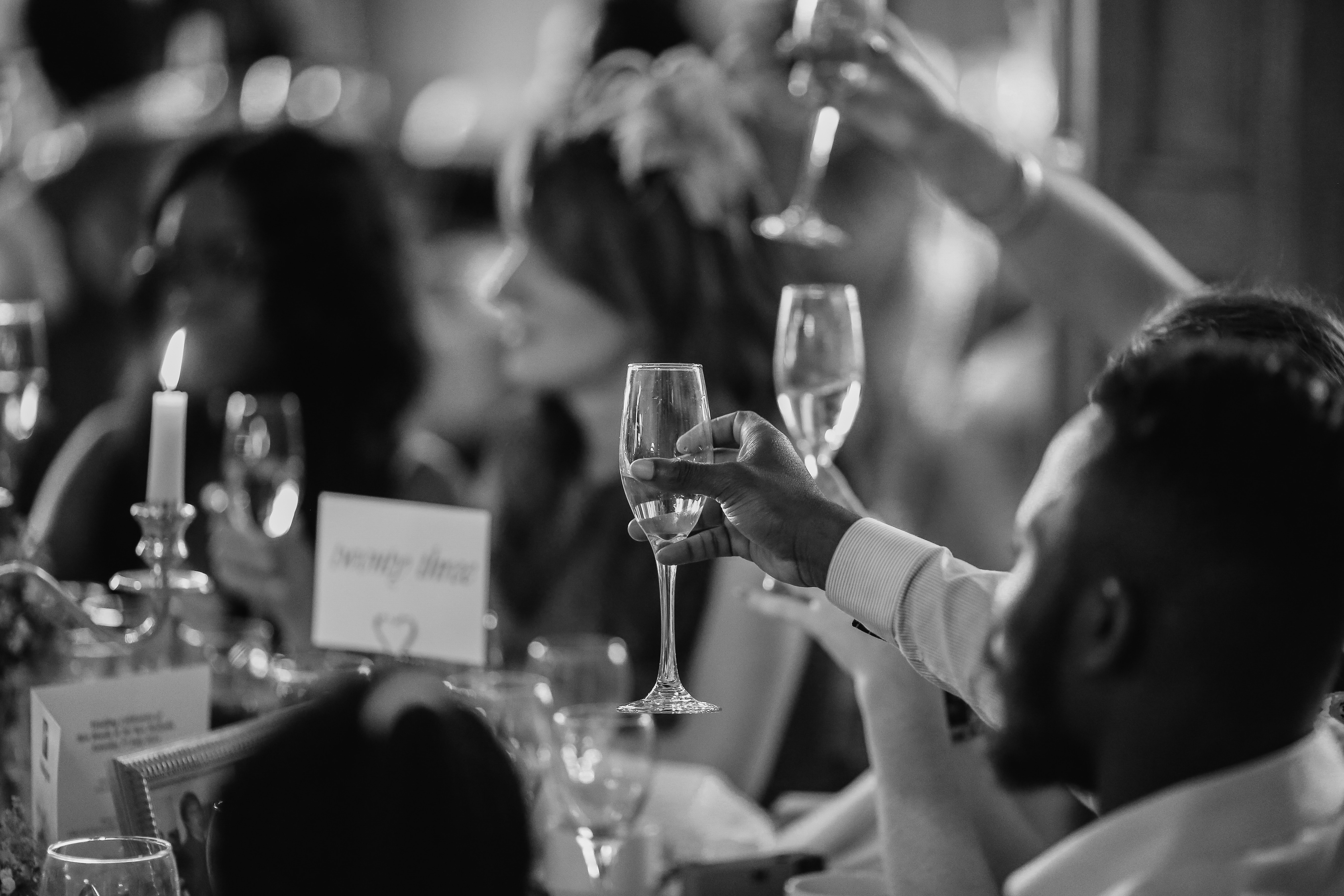 Wedding champagne toast black and white image