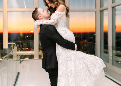 Elegant wedding reception with sunset views at View Boston in Boston MA