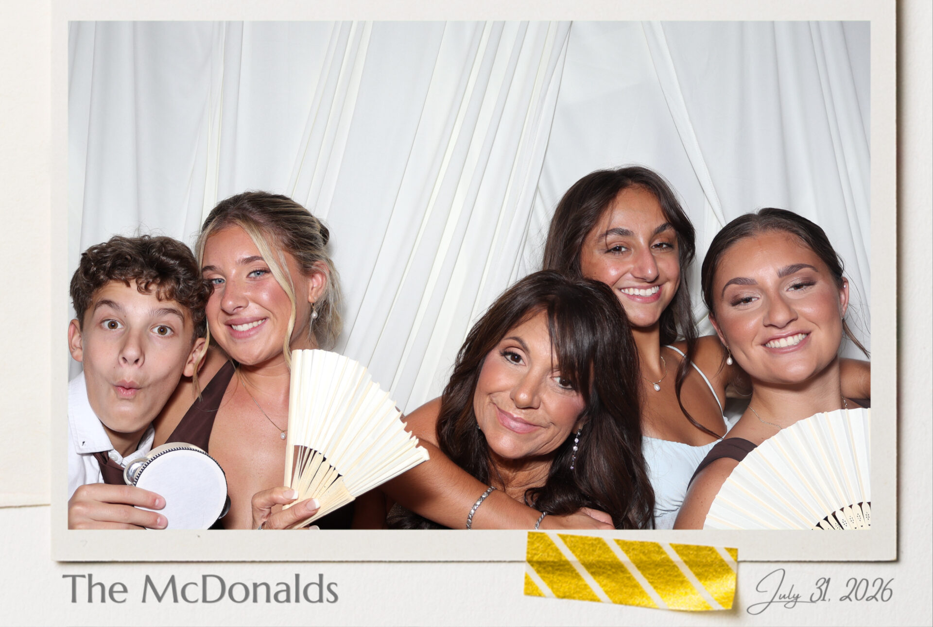 Five guests fitting comfortably in an ultra high resolution 4x6 portrait print photo booth print, custom name and date border, Black Diamond Event Production